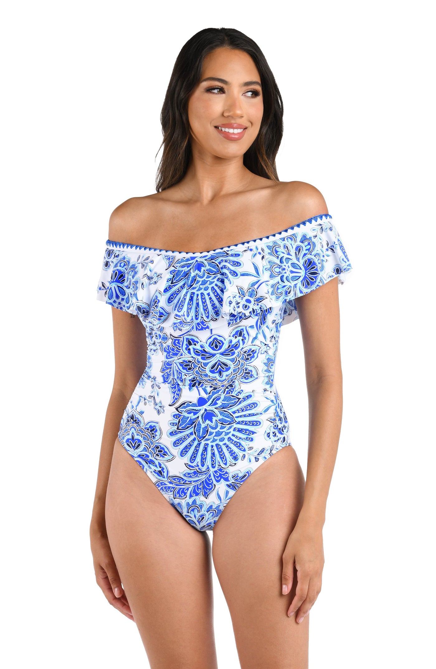 Model is wearing an indigo and white multicolored floral printed Off Shoulder Ruffle One Piece